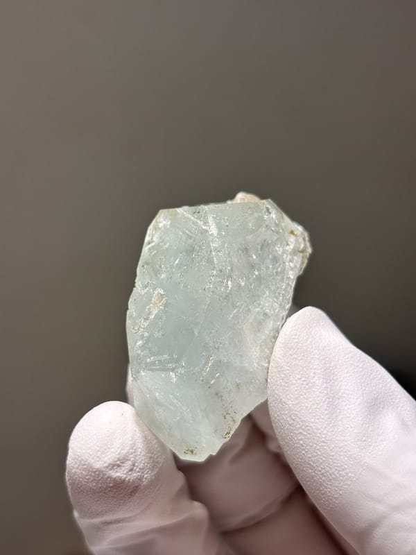 Glassy pale aquamarine with mica fleck from Xuebaoding, Sichuan, China, view 2 of 5