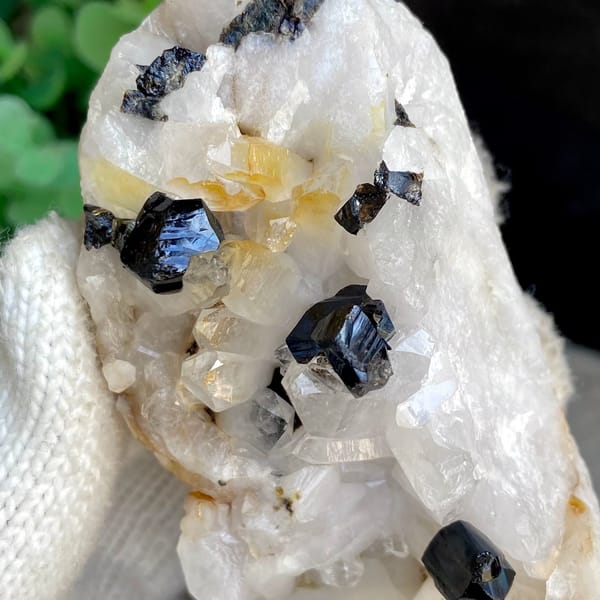 Glossy black cassiterite crystals on white quartz from Yunnan, China, view 4 of 9
