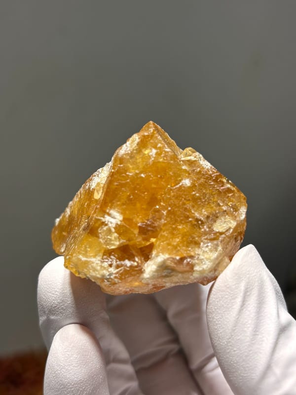 Golden scheelite with mica from Xuebaoding, Sichuan, China, reverse side
