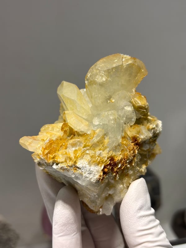 Golden-tinted aquamarine cluster with mica from Xuebaoding, Sichuan, China, reverse side