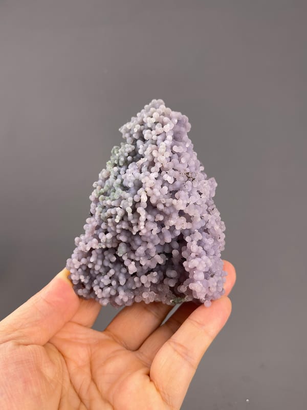 Grape Agate from Indonesia: tapered cluster of lavender and greenish nodules.