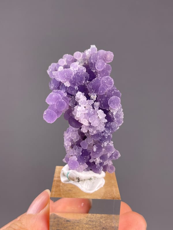 Grape Agate from Indonesia: upright purple nodules with pale accents.
