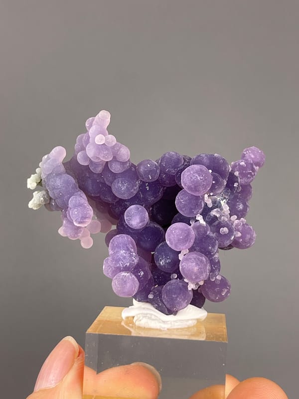 Grape Agate from Indonesia: large purple nodules forming a broad branching cluster.