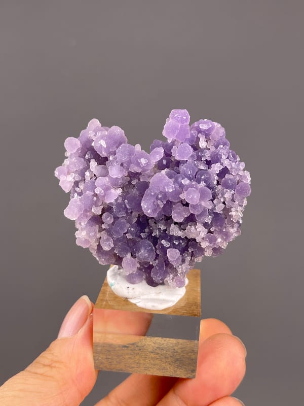 Grape Agate from Indonesia: purple lobes forming two upper rounded shoulders.