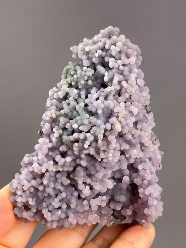 Grape Agate from Indonesia: close view of pale nodules and small cavities.