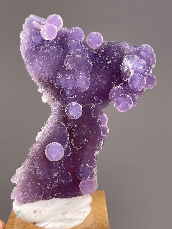 Grape Agate from Indonesia: close view of large purple rounded growths.