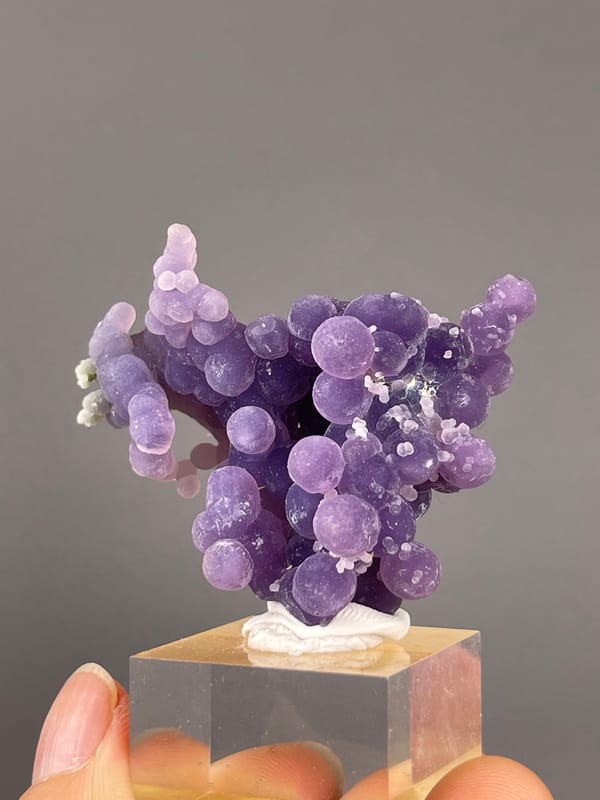 Grape Agate from Indonesia: front view of large botryoidal purple lobes.