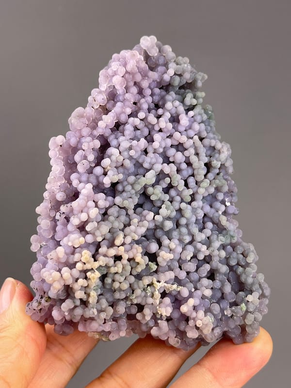 Grape Agate from Indonesia: greenish patches among lavender nodules.