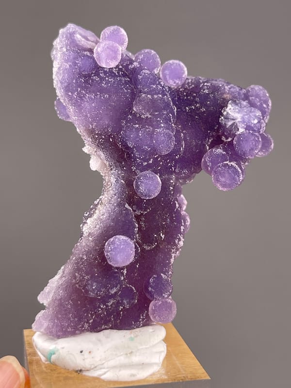 Grape Agate from Indonesia: fine sparkling surface across the purple lobes.