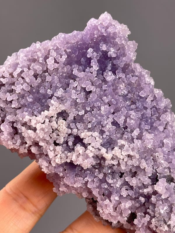 Grape Agate from Indonesia: pale nodules over darker purple surface.