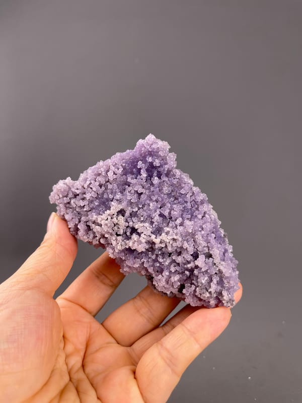 Grape Agate from Indonesia: broad side held horizontally.