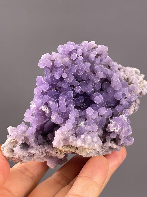 Grape Agate from Indonesia: close view of rounded purple nodules.