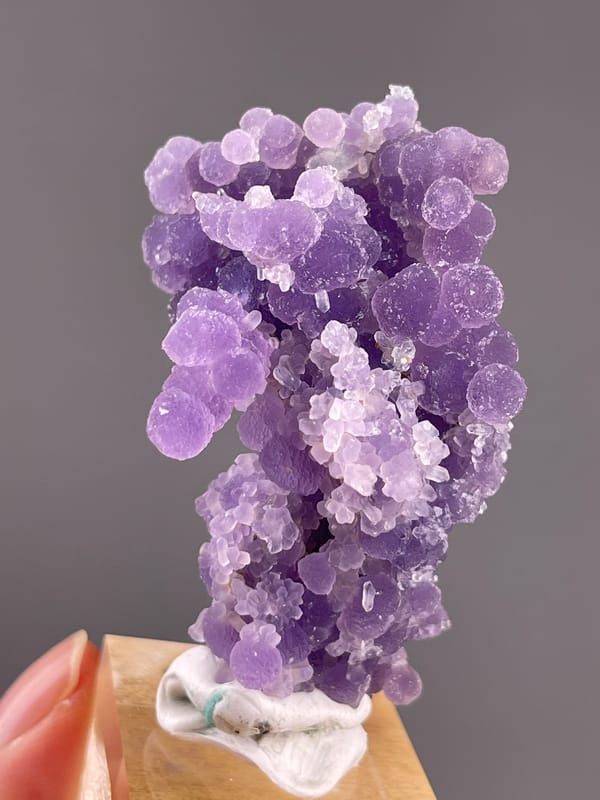 Grape Agate from Indonesia: large rounded purple lobes near the top.