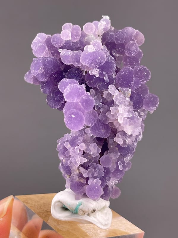 Grape Agate from Indonesia: pale accents among densely grouped violet nodules.