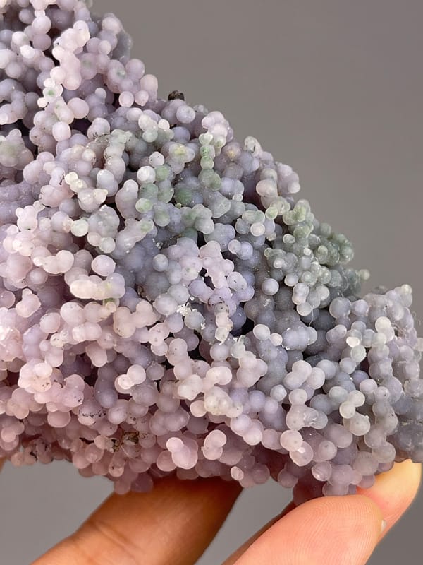 Grape Agate from Indonesia: small lavender nodules along the lower edge.