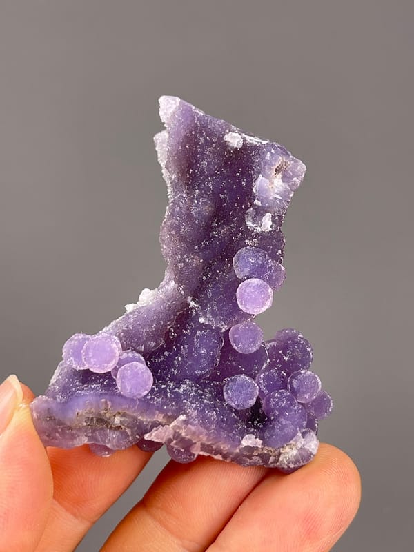 Grape Agate from Indonesia: elongated side with sparse projecting nodules.