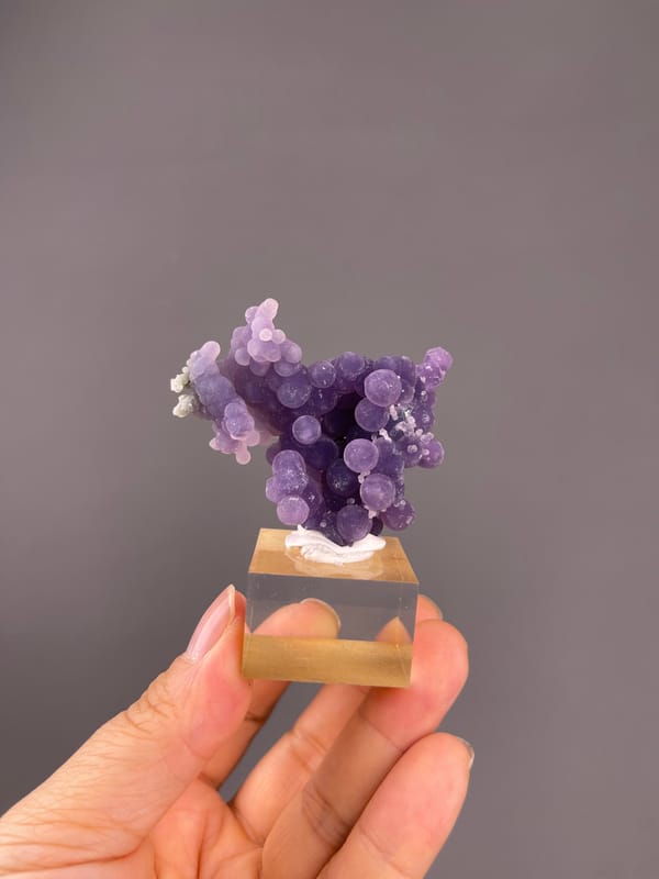 Grape Agate from Indonesia: whole purple specimen viewed from the front.