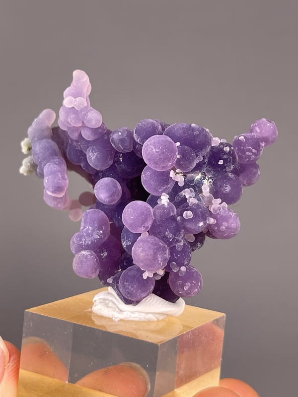 Grape Agate from Indonesia: close view of large violet rounded growths.
