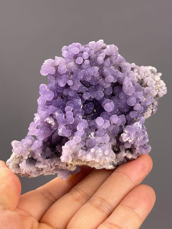 Grape Agate from Indonesia: angled view of the nodular purple surface.
