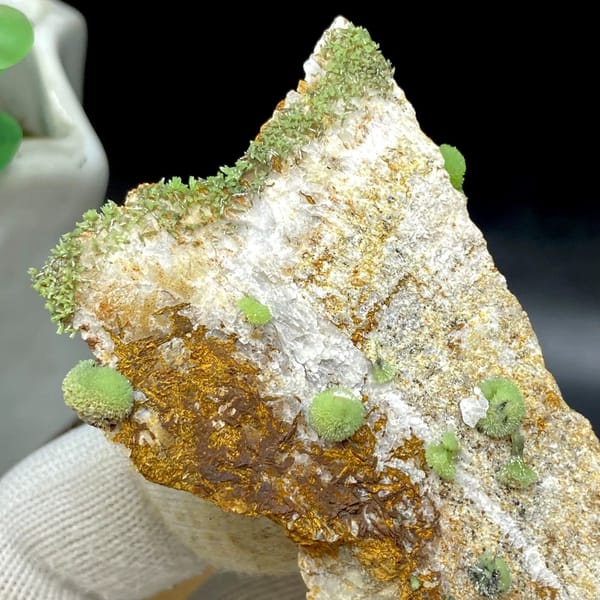 Green pyromorphite balls on tall rusty plate from Guangxi, China, view 4 of 9