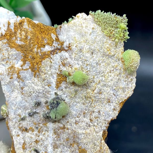 Green pyromorphite balls on tall rusty plate from Guangxi, China, view 6 of 9
