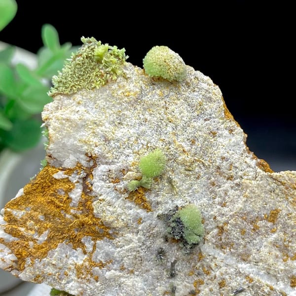 Green pyromorphite balls on tall rusty plate from Guangxi, China, view 8 of 9