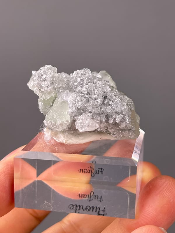Green Fluorite on Quartz specimen from Fujian, China highlighting pale green fluorite cubes on clear quartz