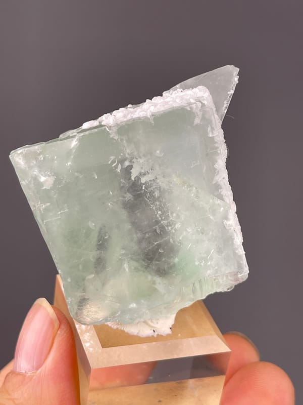 Green Fluorite specimen from Zhejiang, China showing pale green cube with frosted edge