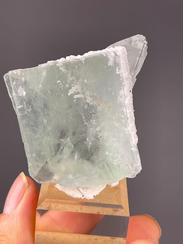 Green Fluorite specimen from Zhejiang, China, defined by pale green cube with frosted edge