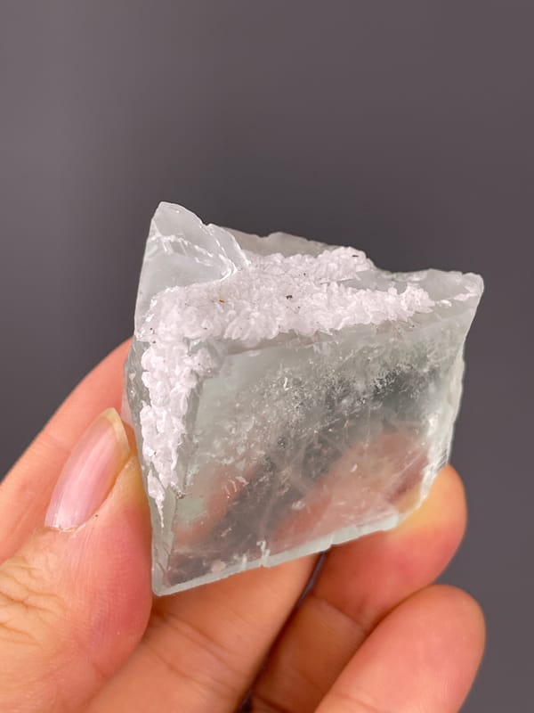 Green Fluorite specimen from Zhejiang, China highlighting pale green cube with frosted edge