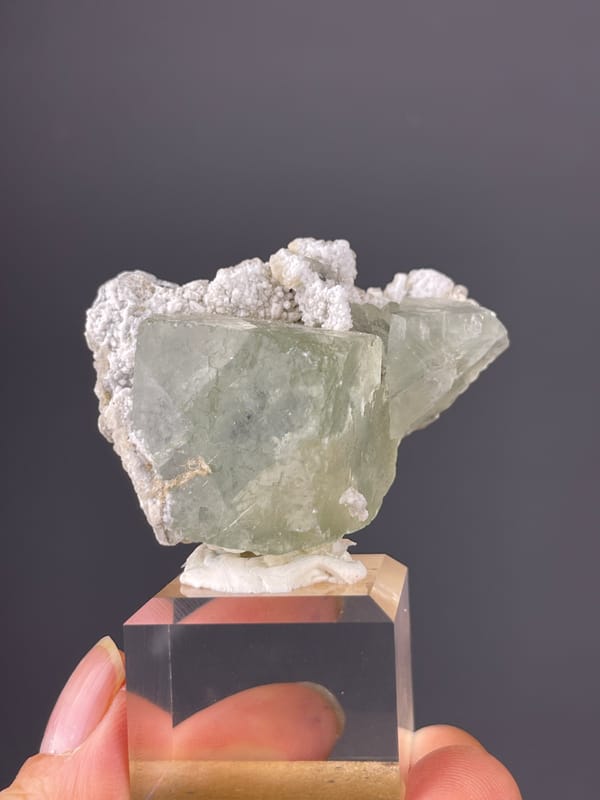 Green Fluorite specimen from Fujian, China highlighting pale green fluorite and white microcrystals