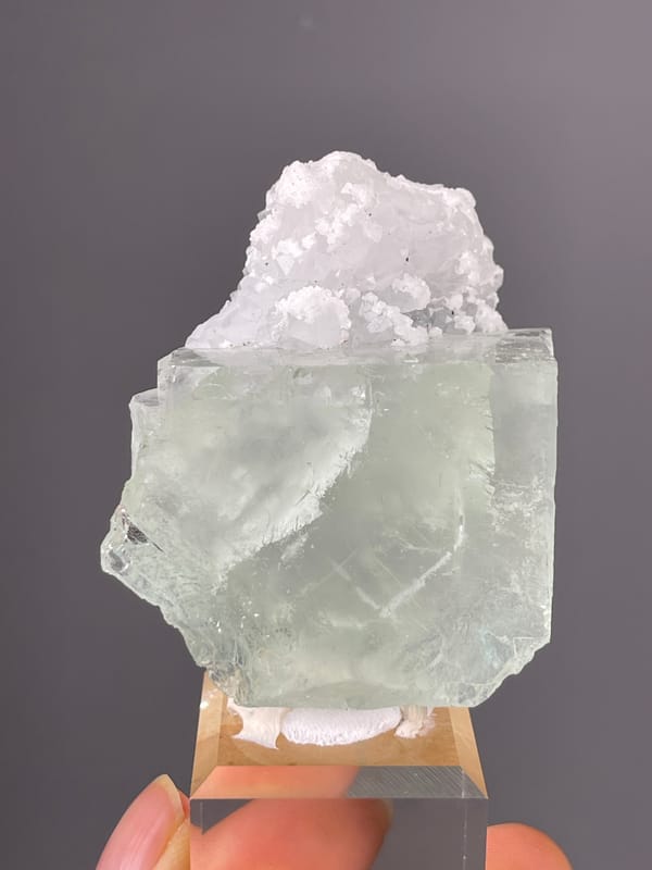 Green Fluorite specimen from Zhejiang, China featuring pale green cube with white cluster