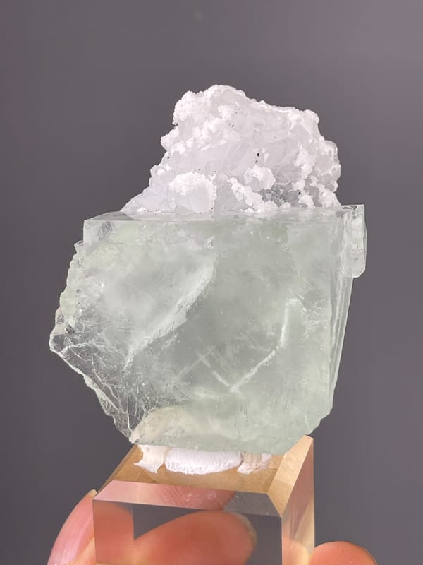 Green Fluorite specimen from Zhejiang, China showing pale green cube with white cluster