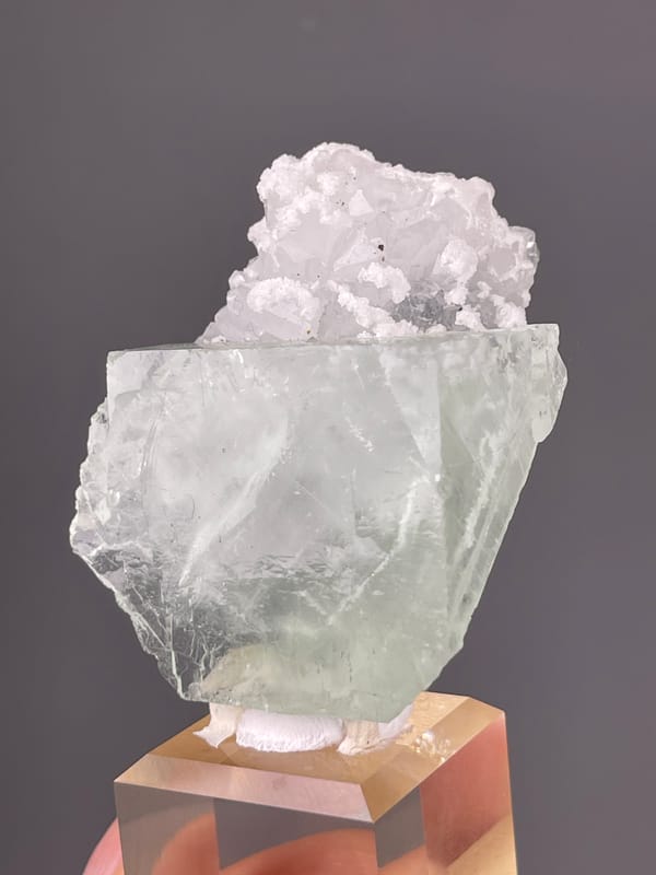 Green Fluorite specimen from Zhejiang, China presenting pale green cube with white cluster