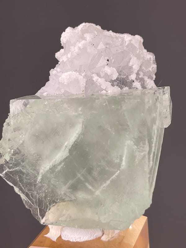 Pale green cube with white cluster on natural green fluorite specimen from Zhejiang, China