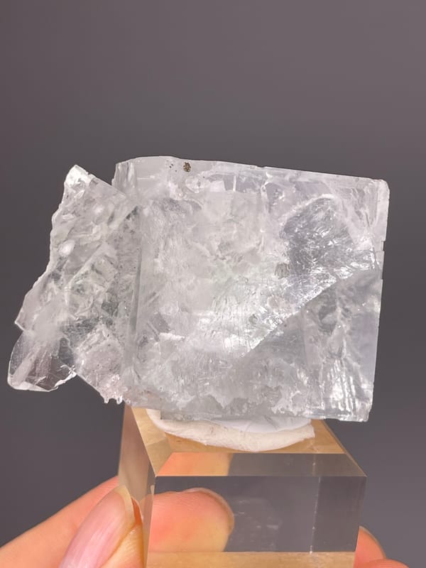 Green Fluorite specimen from Xianghualing, Hunan, China, defined by intergrown colorless cubic crystals