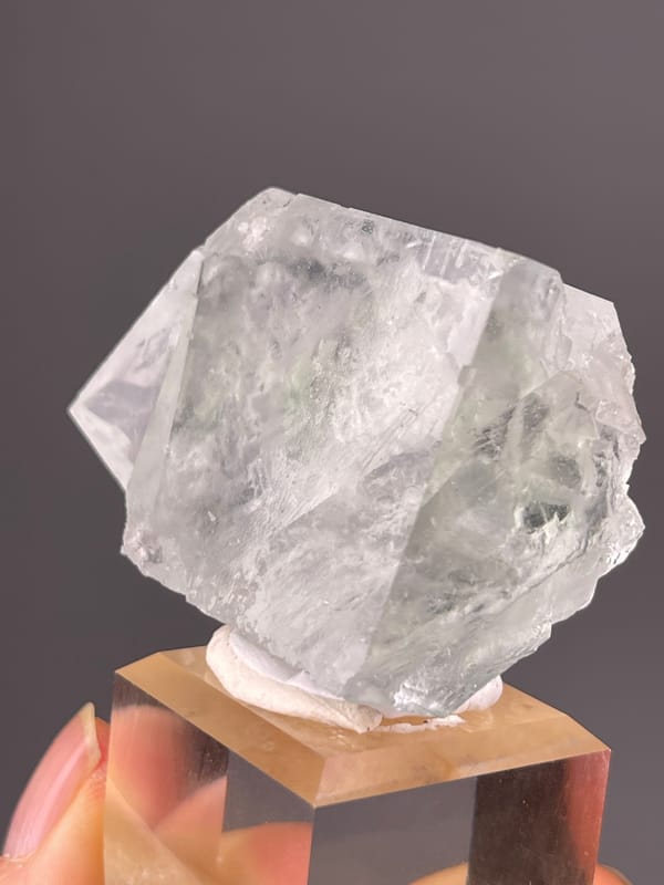 Green Fluorite specimen from Xianghualing, Hunan, China highlighting intergrown colorless cubic crystals