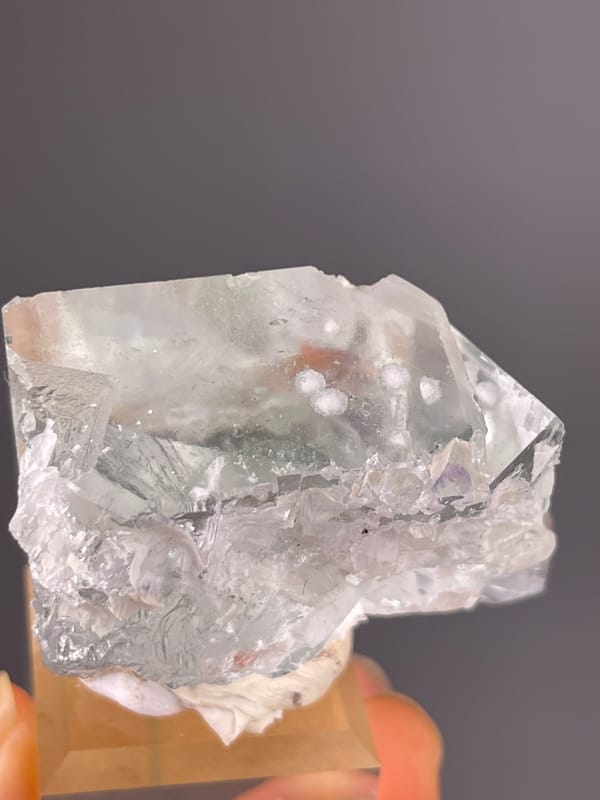 Green Fluorite specimen from Xianghualing, Hunan, China, characterized by intergrown colorless cubic crystals