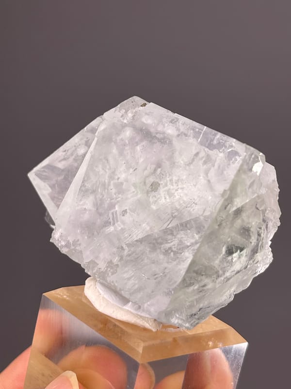 Green Fluorite specimen from Xianghualing, Hunan, China bearing intergrown colorless cubic crystals