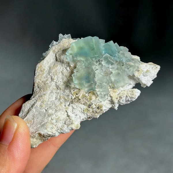 Colour-change fluorite cubes shifting green to blue from Xianghualing, Hunan, China