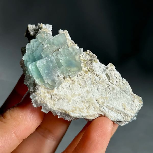 Colour-change fluorite cubes shifting green to blue from Xianghualing, Hunan, China, view 2 of 11