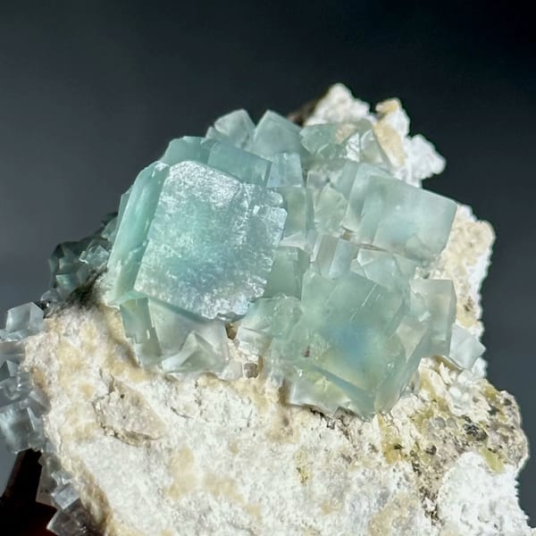 Colour-change fluorite cubes shifting green to blue from Xianghualing, Hunan, China, view 3 of 11
