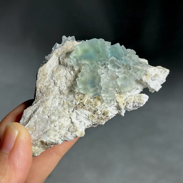 Colour-change fluorite cubes shifting green to blue from Xianghualing, Hunan, China, view 6 of 11