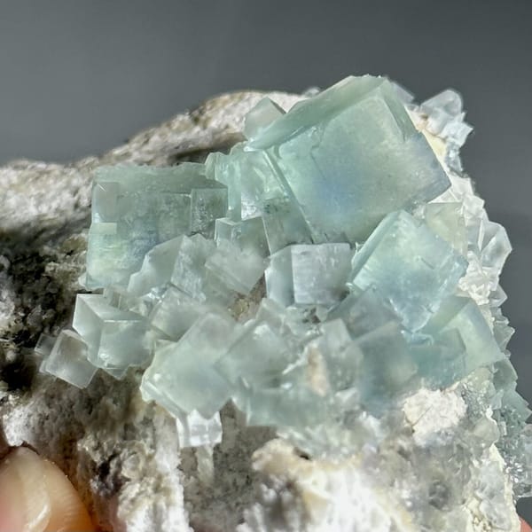 Colour-change fluorite cubes shifting green to blue from Xianghualing, Hunan, China, view 10 of 11