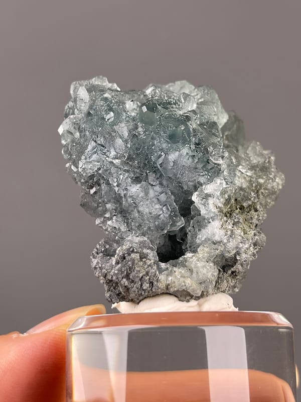Green octahedral fluorite specimen from Fujian, China bearing pale blue-gray octahedral cluster