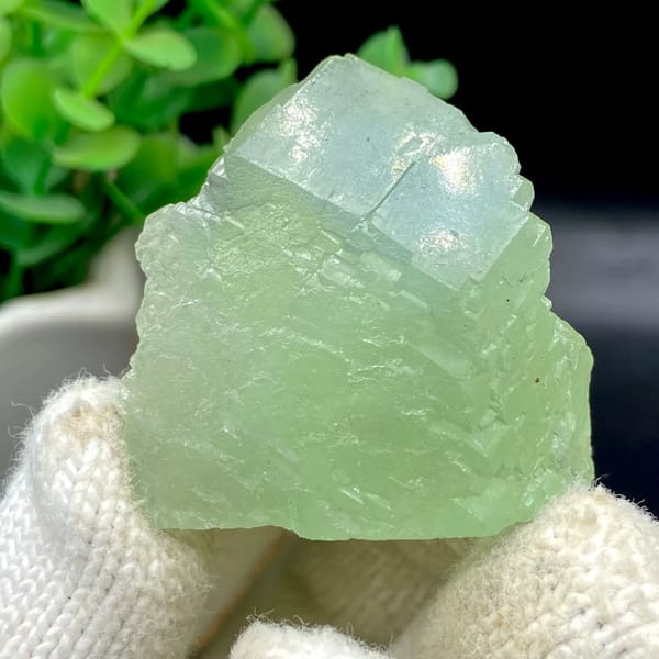 Pale green stepped fluorite cube from Hunan, China, view 2 of 9