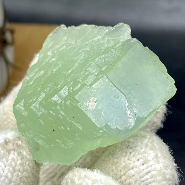 Pale green stepped fluorite cube from Hunan, China, view 3 of 9