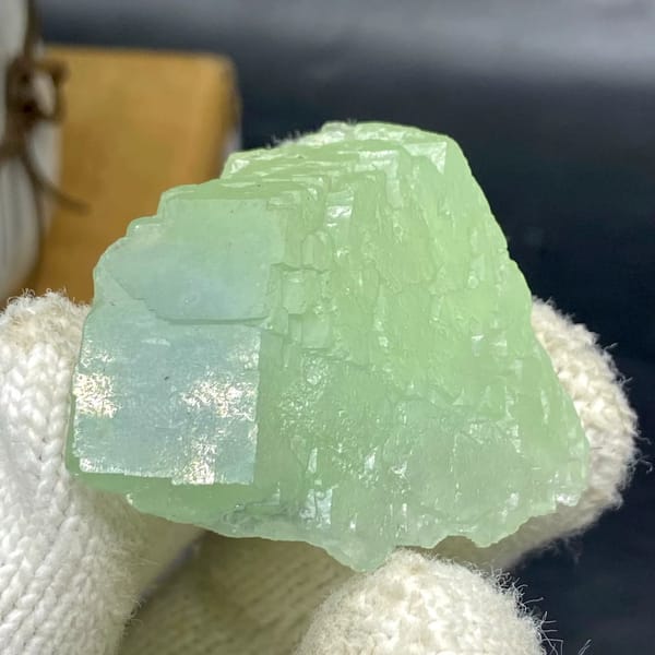 Pale green stepped fluorite cube from Hunan, China, view 4 of 9