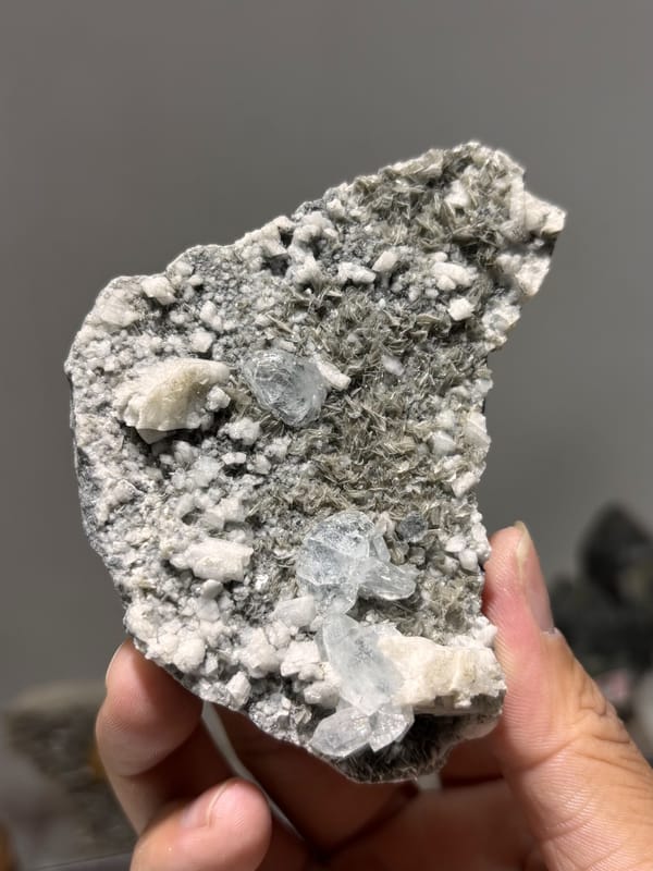 Grey matrix plate with pale aquamarine from Xuebaoding, Sichuan, China, second angle