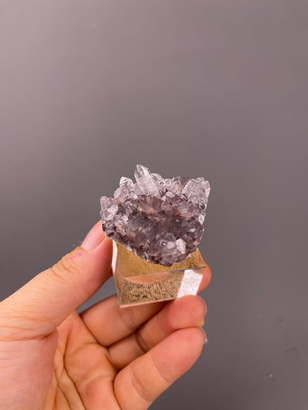 Hematite-Included Quartz specimen from Longyan, Fujian, China, characterized by mauve quartz prisms with red inclusions